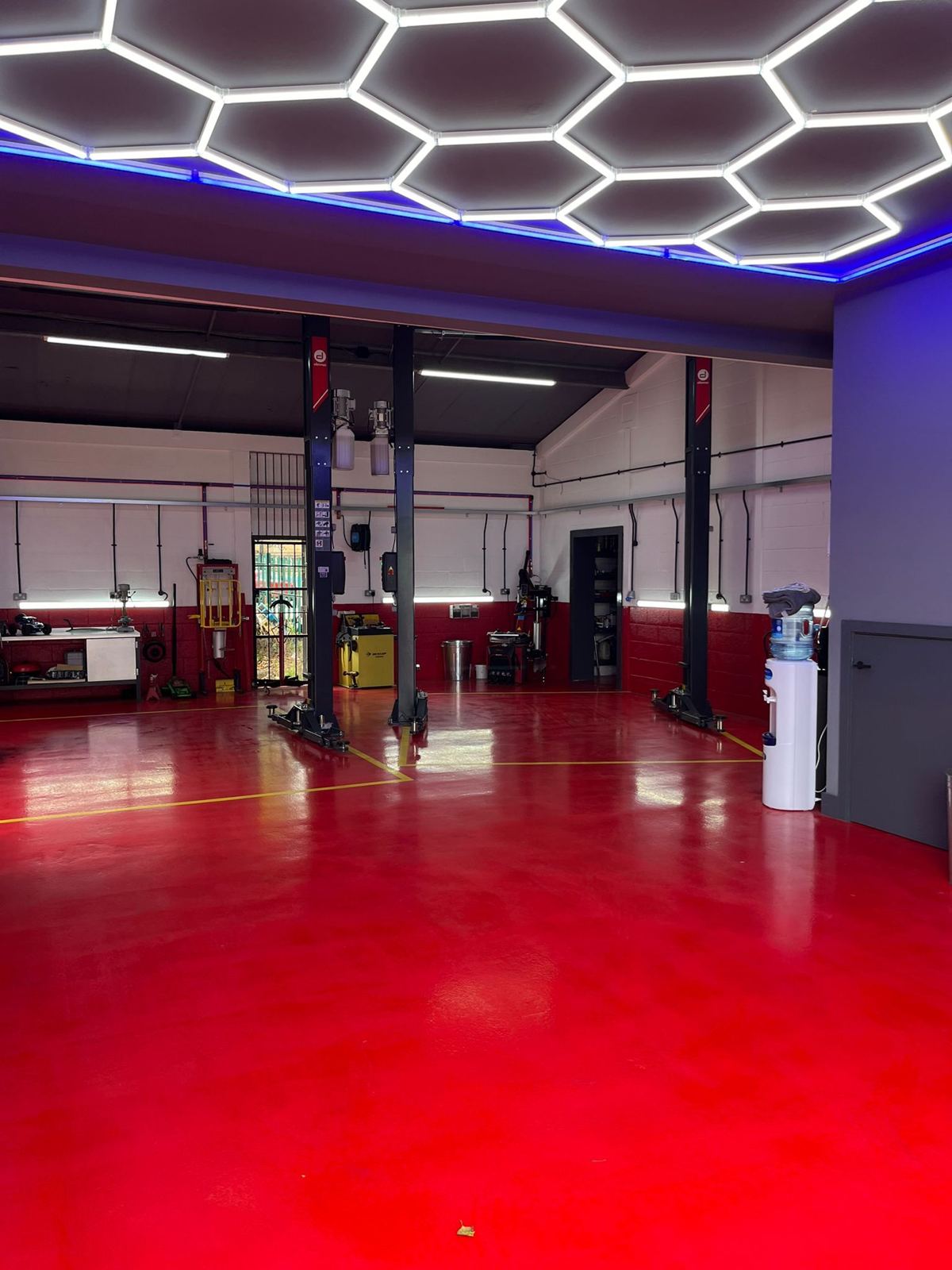 The entrance bay under the hexagon light ceiling