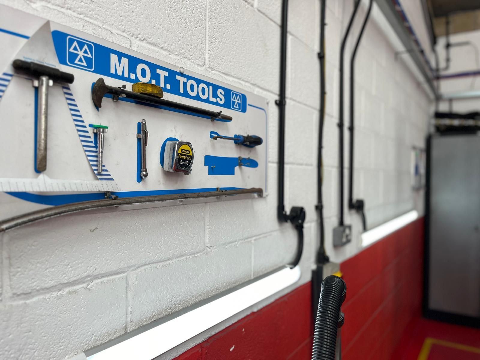 The MOT tools board on the workshop wall
