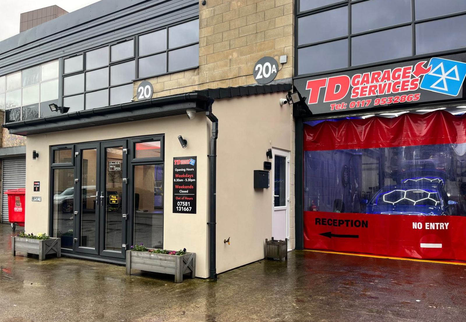 The reception building at Unit 20 next to the garage door