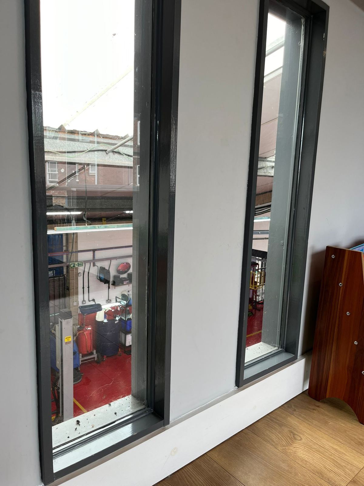 The viewing room window looking straight onto the workshop floor